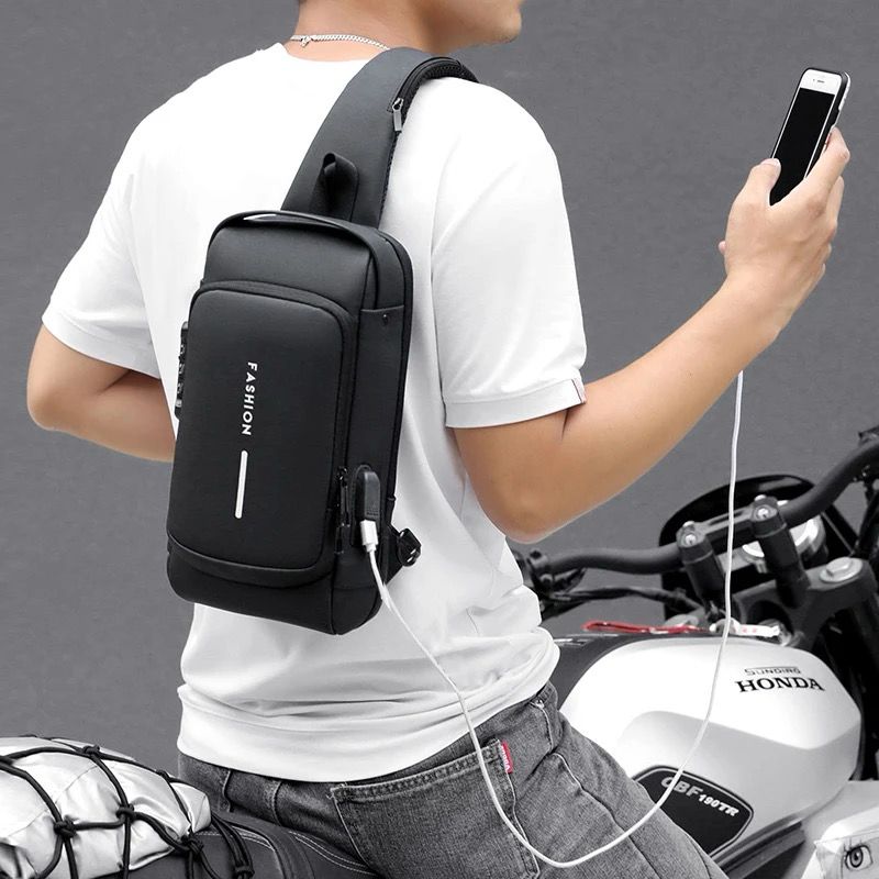 BOLSO MANOS LIBRES ANTIRROBO, CARGA USB, IMPERMEABLE